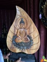 Buddha On Wooden Plank